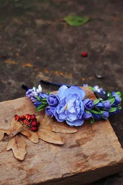 Hoop from flowers, wreath with colored flowers. Handmade flowers