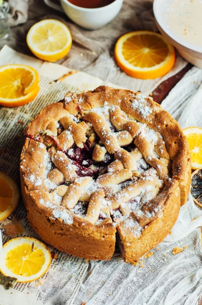 Homemade pesonen cake with cherry filling for breakfast family.