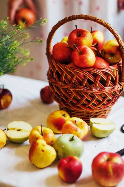 Apples  on white table. Sweet apples on table on bright backgrou