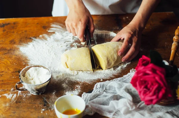 Ingredients for baking cake stuffed with fresh cherry pie. Female preparing cherry pie. Rustic dark style. See series recipe step on step. Womans hands. Recipe for homemade pie on short pastry