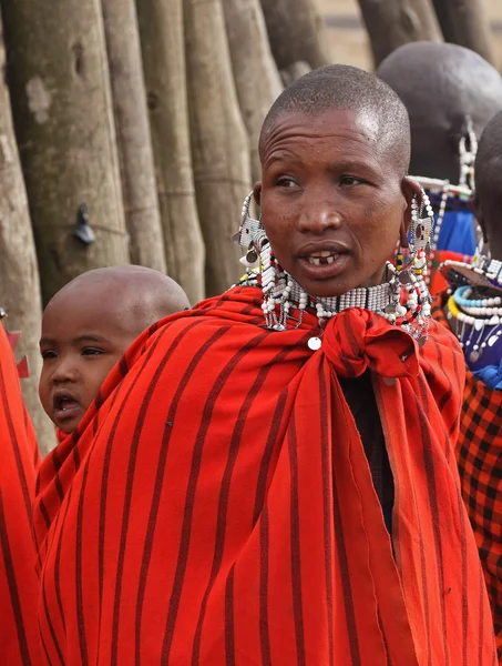 Portrait of Masai woman and baby with traditional beaded decorations, Tanzania