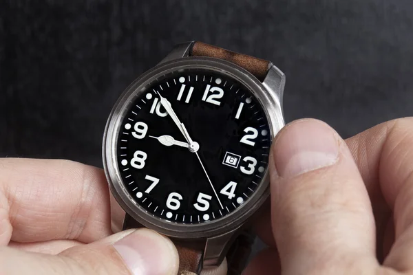 Man hand  watch with leather strap