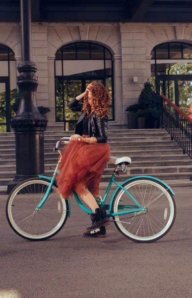 Girl riding her bike in the city