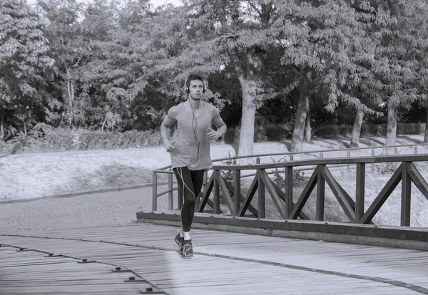 Young man jogger runner black and white