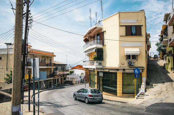 THESSALONIKI, GREECE - MAY 27, 2015: Small houses with sea view in the upper part of the city of Thessaloniki. Steep streets and crossroads on the hill.