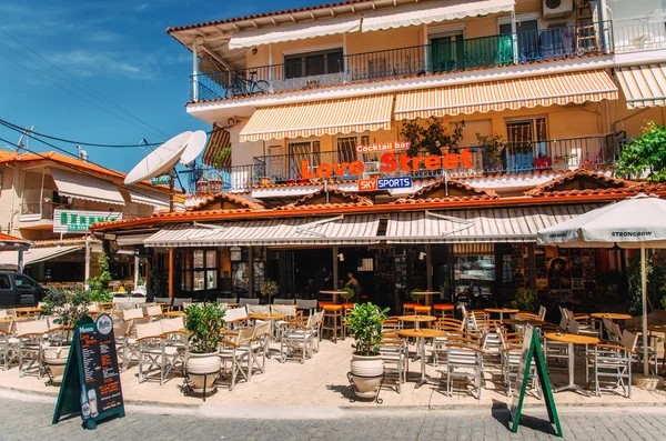 Typical building on the central square in Hanioti on Kasandra penisula, Halkidiki, Greece