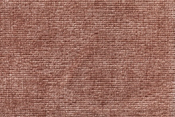 Brown background from soft textile material. Fabric with natural texture.