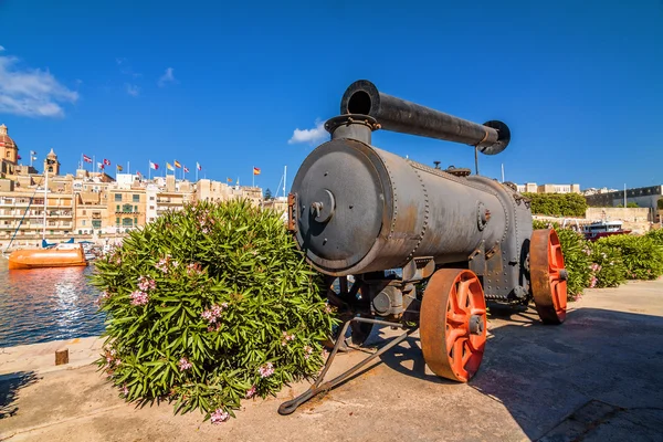 Steam machine in Valletta port, Malta.