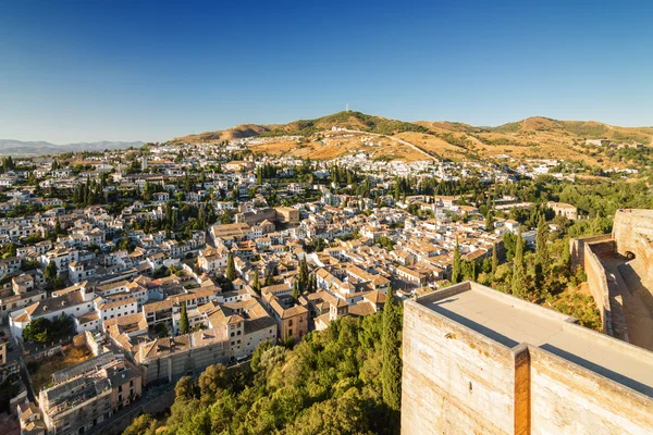 Sunny view of Granada from the top of Tower of Alhambra, Andalusia province, Spain.