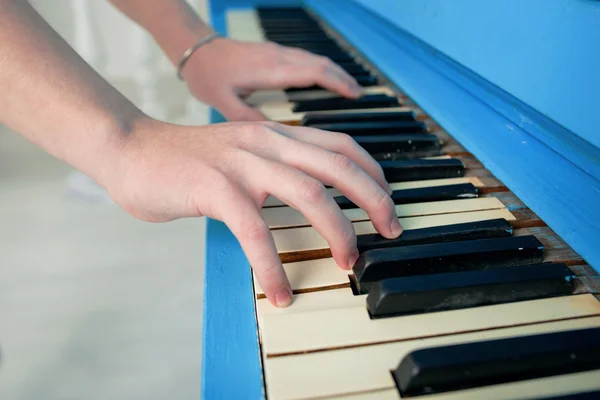 Hands and keys close up