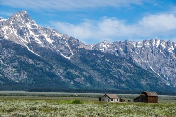 Flying Over Grand Tetons Landscape Farmhouse with Barn