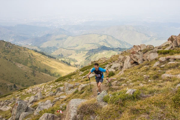 ALMATY, AUGUST 20: Skyrunner runs in the mountains on August 20, 2016, Almaty (Kazakhstan)