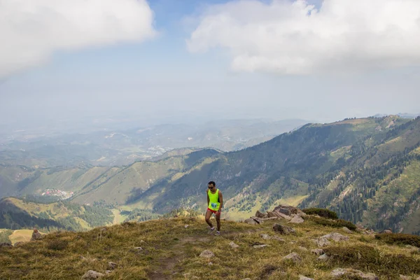 ALMATY, AUGUST 20: Skyrunner runs in the mountains on August 20, 2016, Almaty (Kazakhstan)