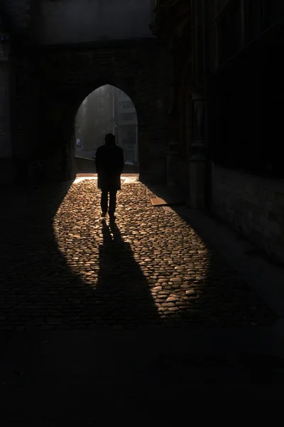 Man in shadows