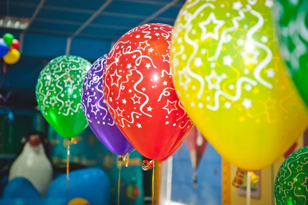 Balloons and celebration concept - lots of colorful balloons