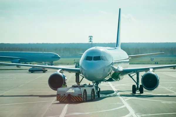 The plane on the runway.