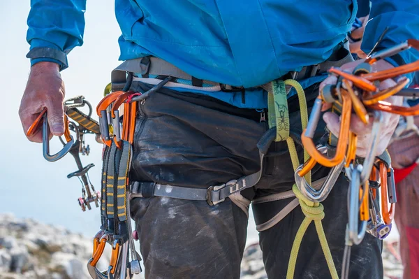 Climbing equipment on man