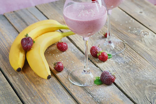 Delicious strawberry and banana smoothie, yogurt or milk shake w