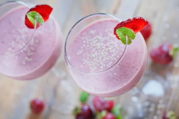 Delicious strawberry and banana smoothie, yogurt or milk shake w