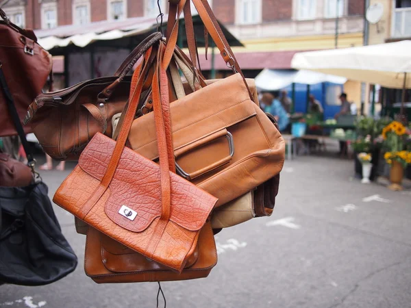 Brown leather bag at flea market