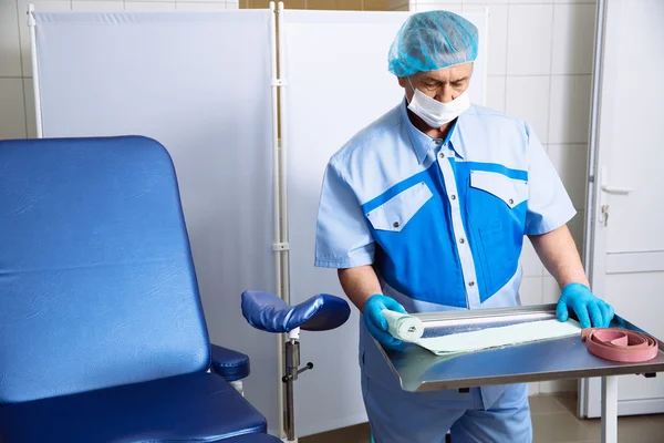 Doctor in operating room with medical tools. Concept of a hospital and healthy