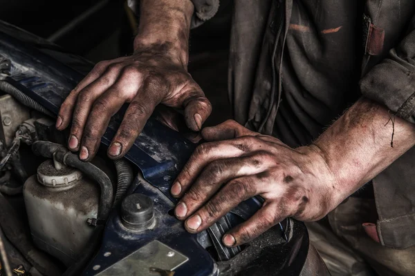 Working man near engine