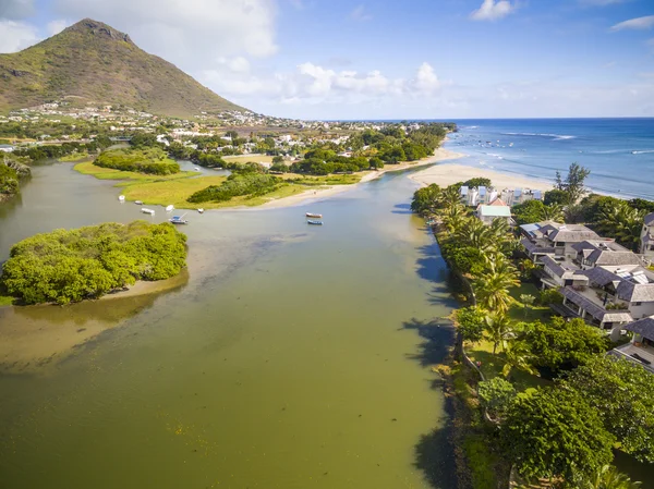 Top down aerial view of Black River Tamarin - Mauritius beach. Curepipe Black River Gorge National Park in background