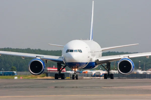 Close up image of passenger airplane on the runway