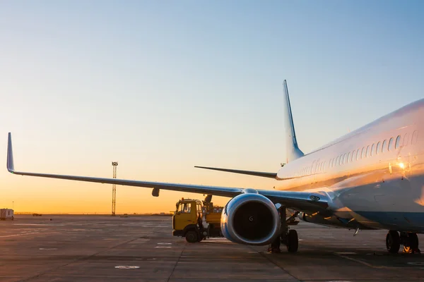 Aircraft maintenance in the morning airport apron