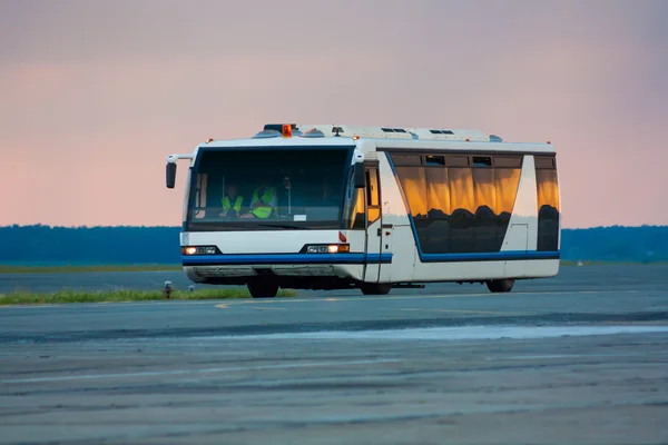 Airport bus in the morning light