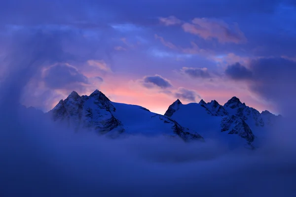 Foggy morning in Italian Alps