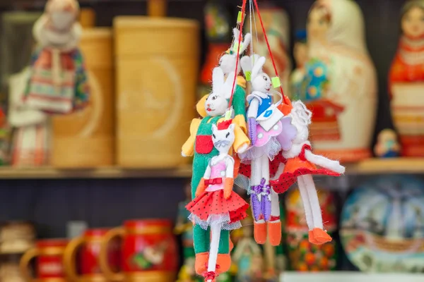 Puppets on a string. Showcases counter located on the Arbat in the city of Cheboksary.