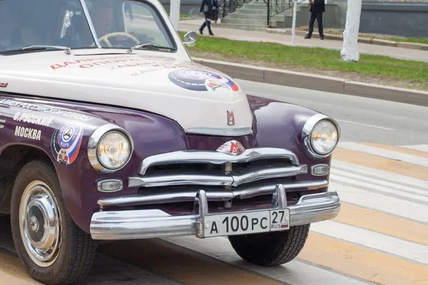 The procession, parade May 1, 2016 in the city of Cheboksary, Chuvash Republic, Russia. Retro cars on the road.