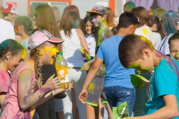 Happy girl. The festival of colors Holi in Cheboksary, Chuvash Republic, Russia. 05/28/2016