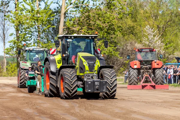 German claas axion tractor drives on track
