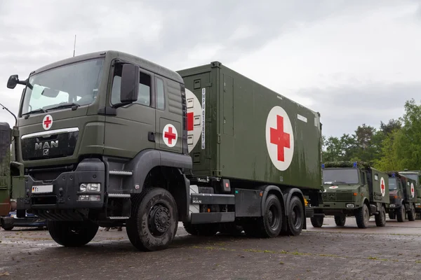 German rescue center system on trucks stands on plate