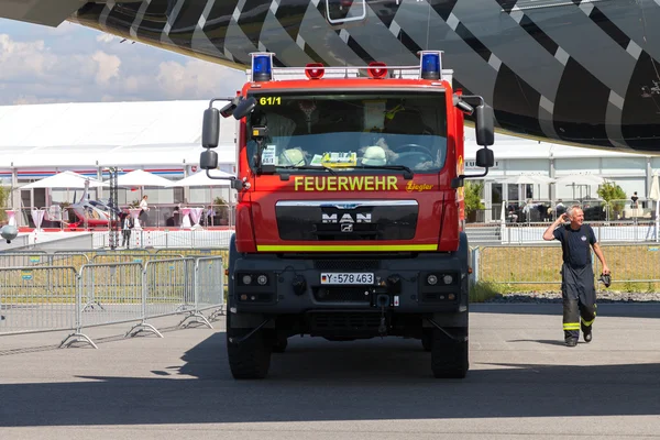 German fire service truck stands on airport