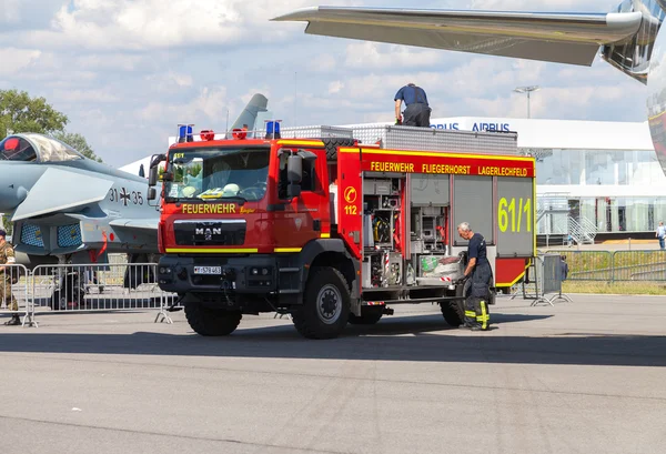 German fire service truck stands on airport