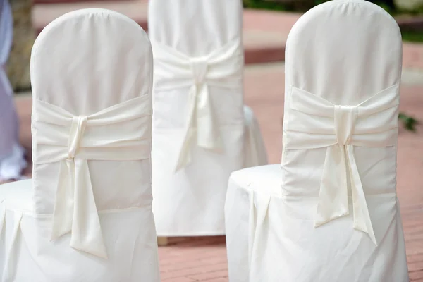 Beautiful fabric bows on chairs