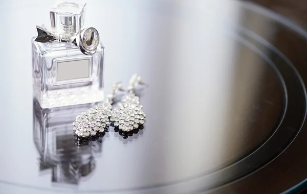 Beautiful wedding rings and perfume bottle