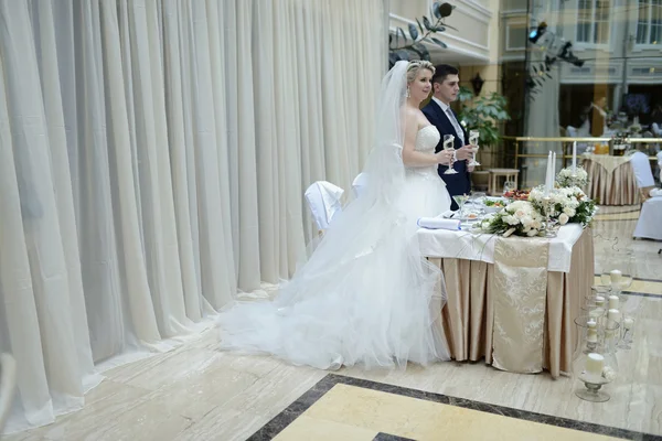 Beautiful wedding couple in restaurant