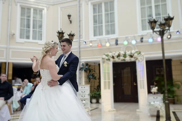 Wedding couple dancing in restaurant