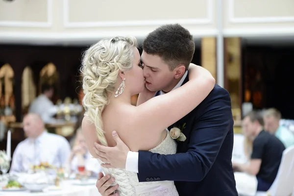 Wedding couple dancing in restaurant