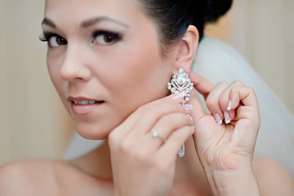Beautiful bride wearing jewelry