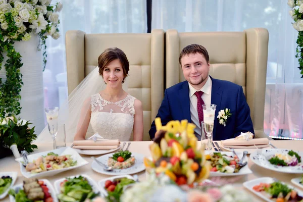 Beautiful wedding couple in restaurant