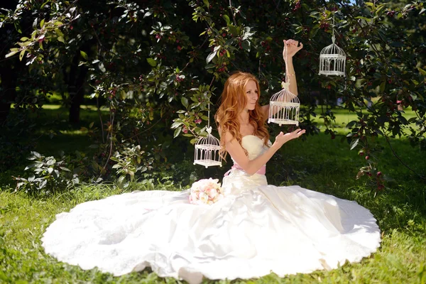 Beauty bride with bouquet on nature