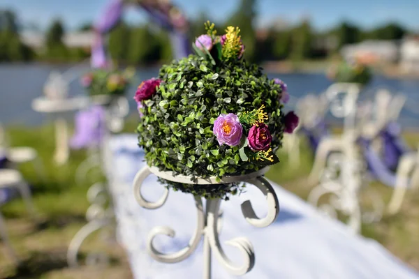 Wrought iron stand with flowers