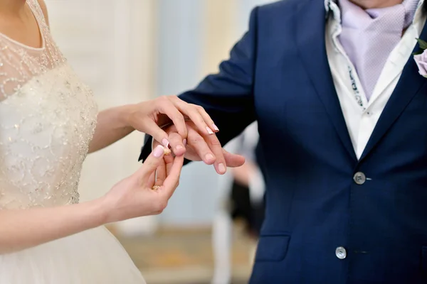 Bride and groom registering marriage