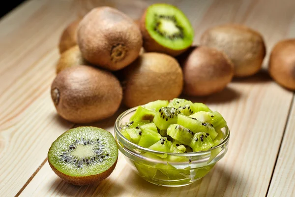 Healthy food. Tropical fruit. Whole and sliced kiwi. Kiwi fruit.