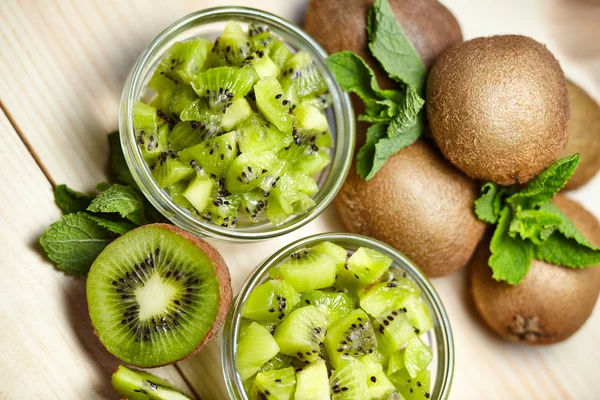 Healthy food. Tropical fruit. Whole and sliced kiwi. Kiwi fruit.